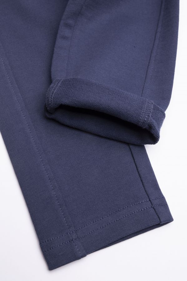 Teplákové kalhoty tmavě modré barvy s ozdobným vázáním 2155820