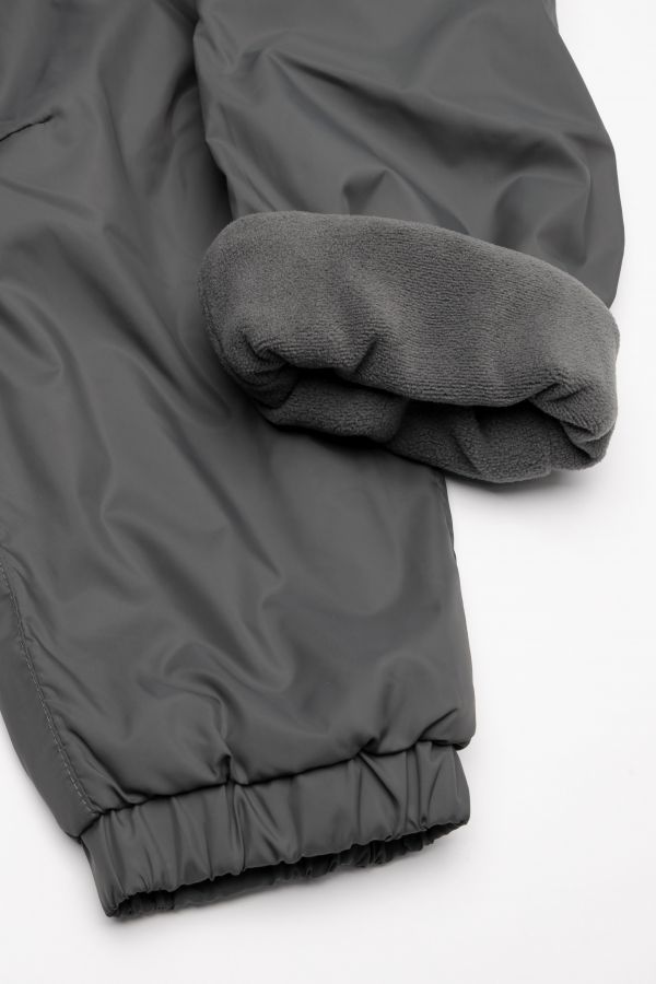 Zateplené kalhoty grafitové s reflexním potiskem a fleecovou podšívkou 2200359