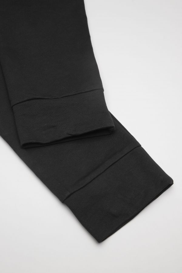 Teplákové kalhoty černé s kapsami na nohavicích 2111471
