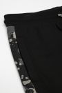 Teplákové kalhoty černé s vázáním v pase, střih regular 2200414