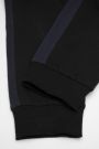 Teplákové kalhoty černé s vázáním v pase, střih regular 2111493