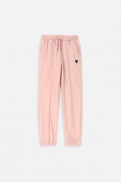 Teplákové kalhoty v barvě pudrově růžové se srdíčkem-kočkou